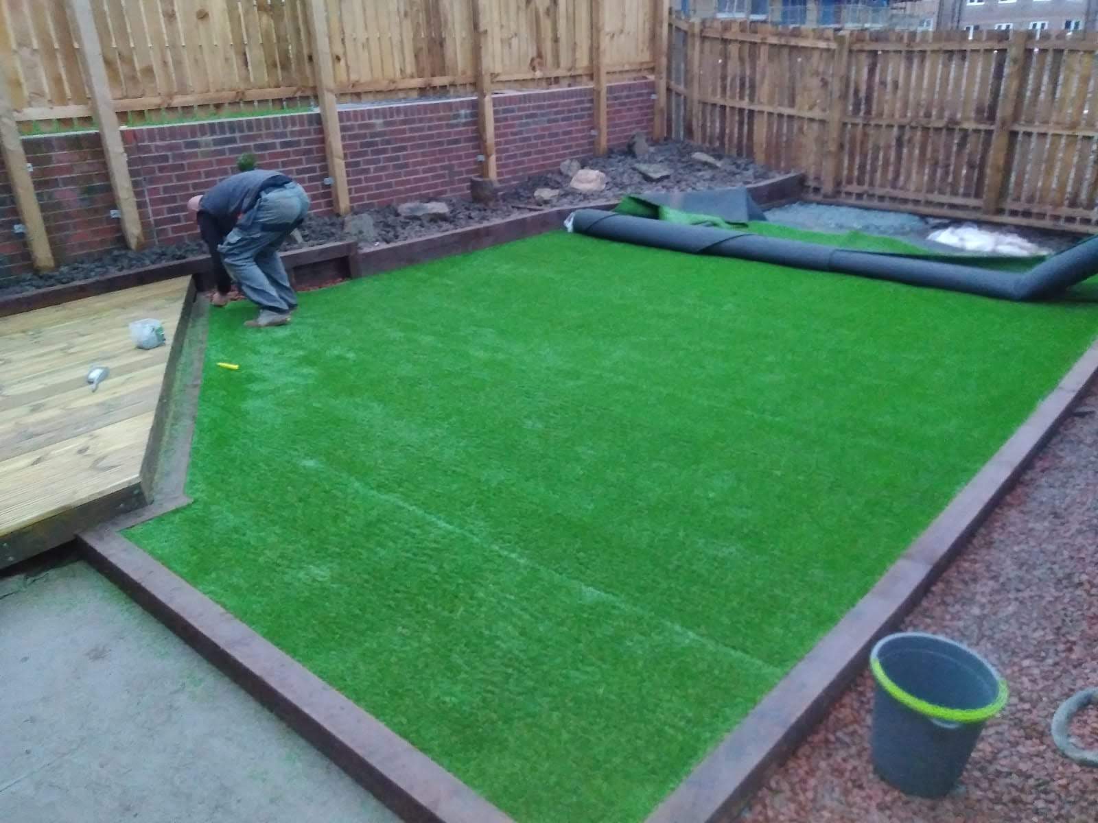 artifiacial grass being laid 1